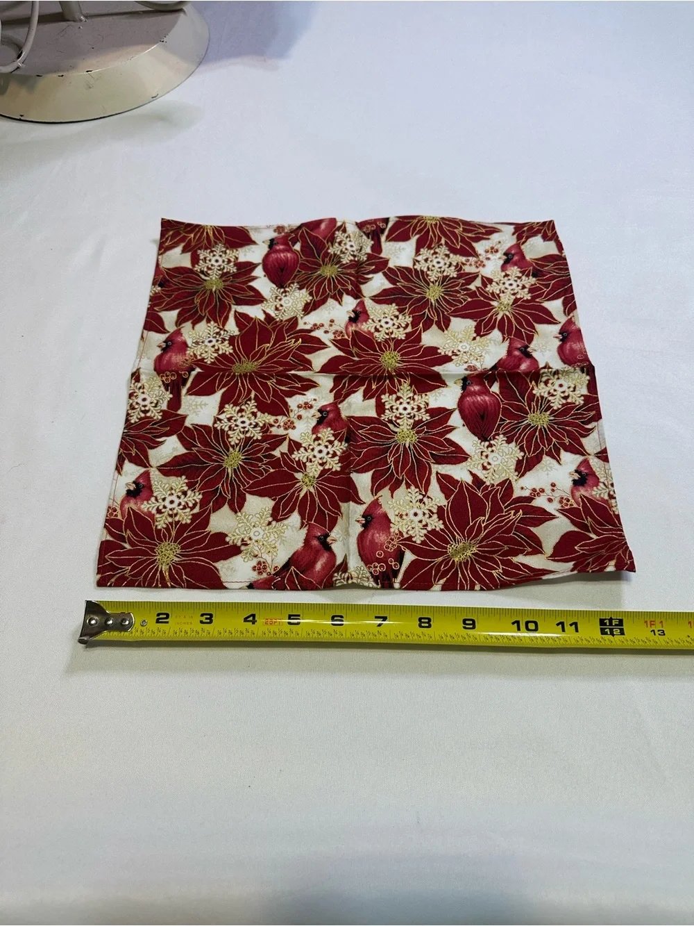 Poinsettia and cardinal apron, napkin, and table runner set